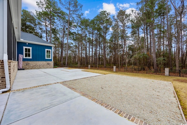 view of yard with a patio area and fence