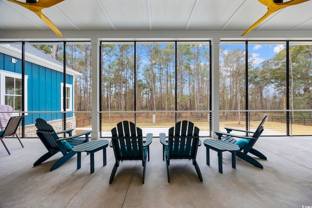 unfurnished sunroom featuring plenty of natural light