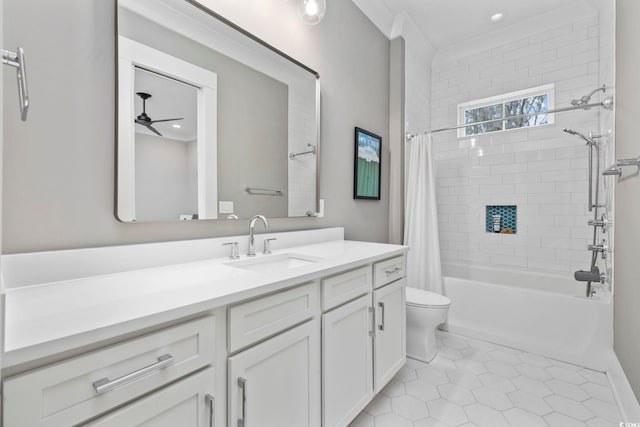 bathroom with a ceiling fan, toilet, shower / tub combo with curtain, tile patterned flooring, and vanity