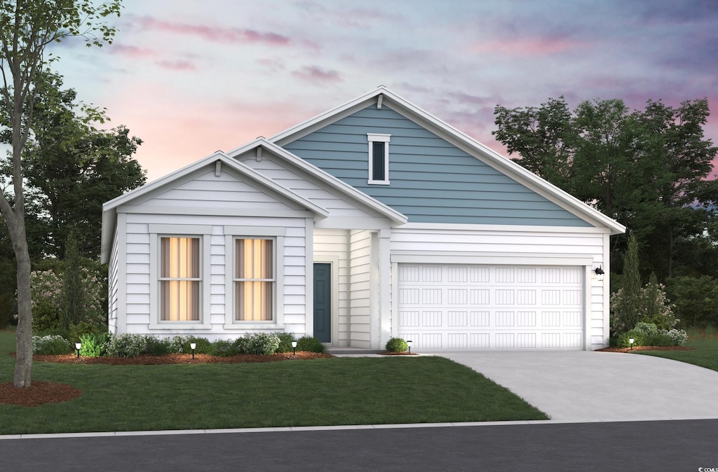 435 Kapalua Loop, Little River, SC 29566 - view of front facade with concrete driveway, a front lawn, and an attached garage