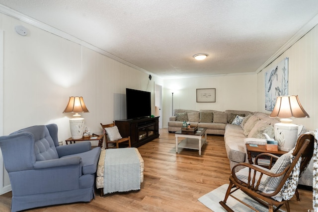 613 Calhoun Dr, Murrells Inlet, SC 29576 - living area featuring crown molding, a textured ceiling, and light wood-type flooring