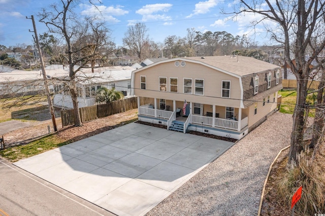 613 Calhoun Dr, Murrells Inlet, SC 29576 - view of front facade with covered porch, a gambrel roof, and roof with shingles