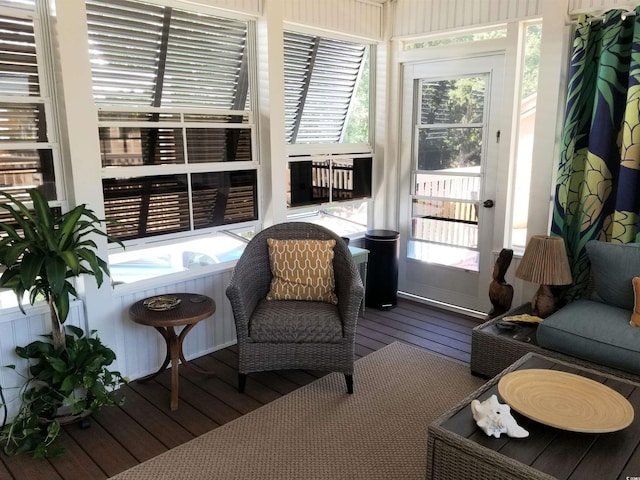 sunroom / solarium featuring a healthy amount of sunlight