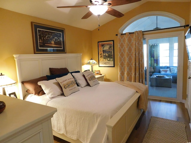 bedroom with lofted ceiling, ceiling fan, and wood finished floors