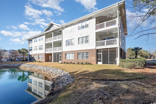 view of building exterior featuring a water view