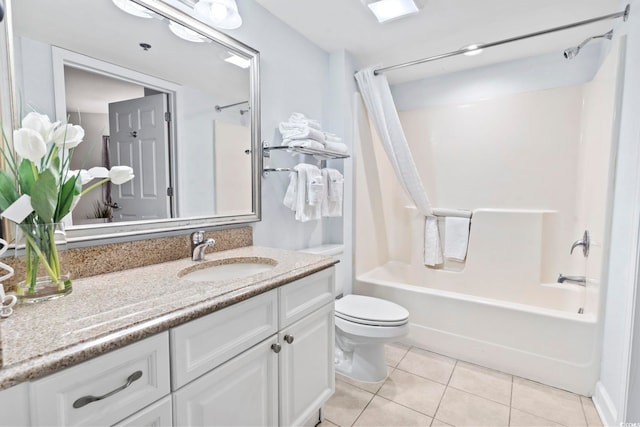 bathroom with vanity, tile patterned flooring, toilet, and shower / tub combo with curtain