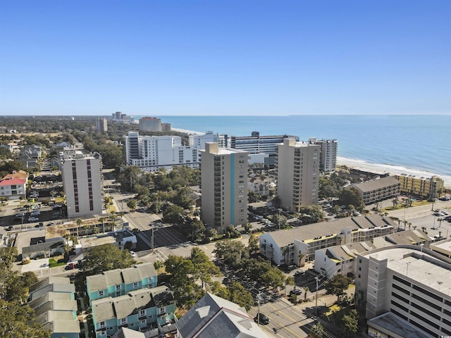 bird's eye view featuring a water view and a city view