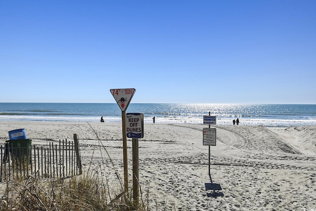 view of water feature with a beach view