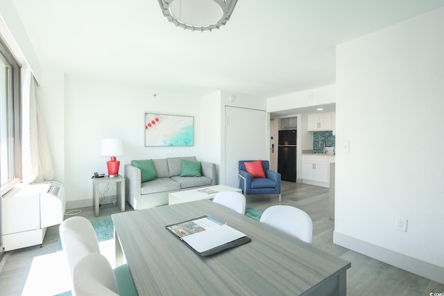 2401 S Ocean Blvd Unit 971, Myrtle Beach, SC 29577 - living room featuring light wood-style floors and baseboards