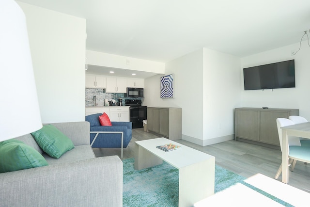 2401 S Ocean Blvd Unit 971, Myrtle Beach, SC 29577 - living area with baseboards, light wood finished floors, and recessed lighting