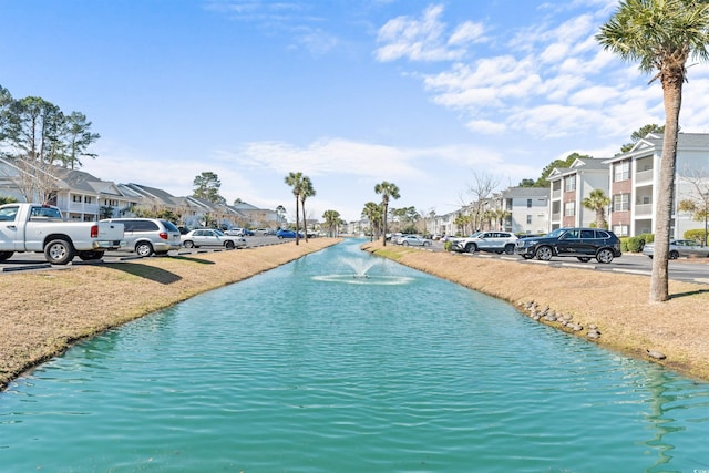 view of water feature with a residential view