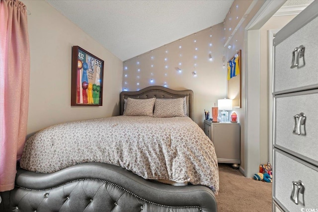 bedroom with lofted ceiling, a textured ceiling, carpet flooring, baseboards, and wallpapered walls