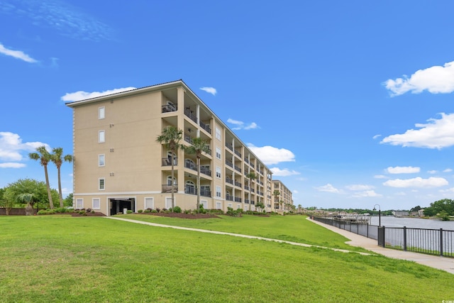 view of building exterior featuring a water view