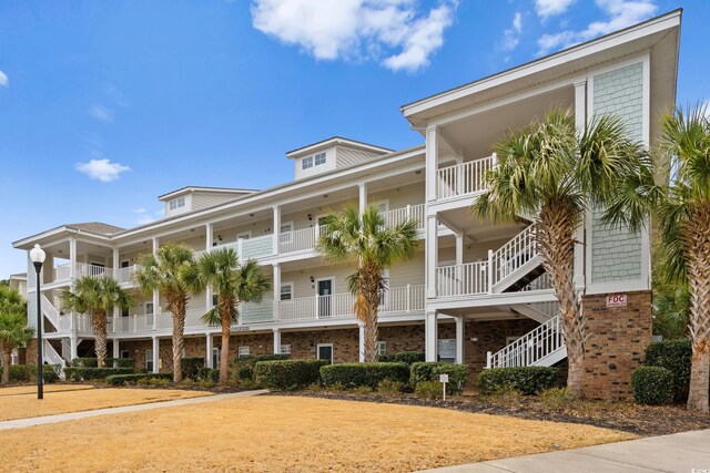 6253 Catalina Dr Unit 921, North Myrtle Beach, SC 29582 - view of property with stairs