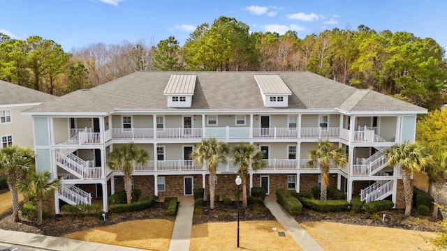 6253 Catalina Dr Unit 921, North Myrtle Beach, SC 29582 - view of property featuring stairs