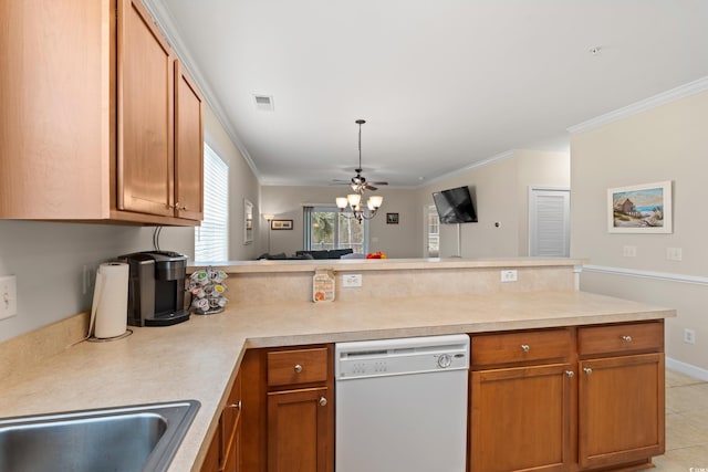 kitchen with light countertops, visible vents, open floor plan, white dishwasher, and a peninsula