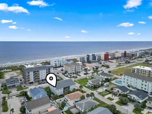 drone / aerial view featuring a water view and a city view