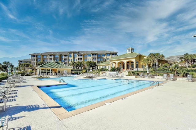 pool featuring a patio area