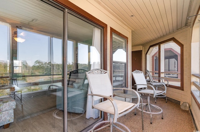 sunroom with wood ceiling