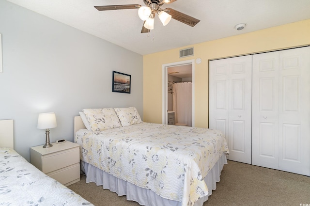 bedroom featuring a ceiling fan, carpet, a closet, and visible vents