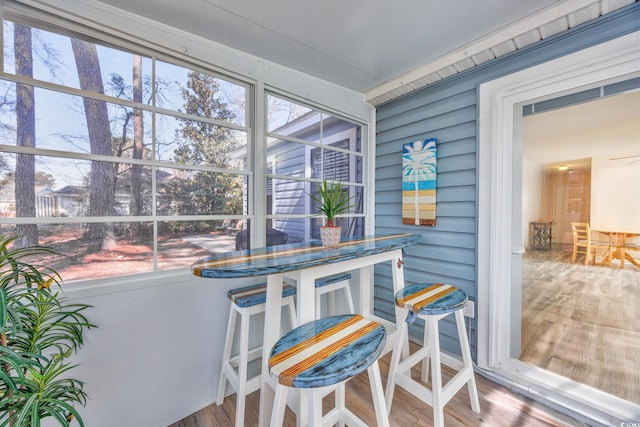 sunroom featuring plenty of natural light