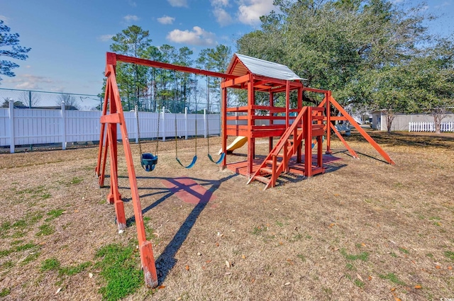 view of jungle gym with fence