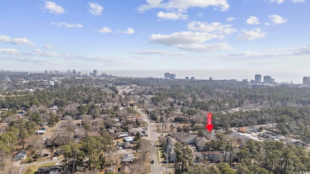 bird's eye view featuring a city view and a water view