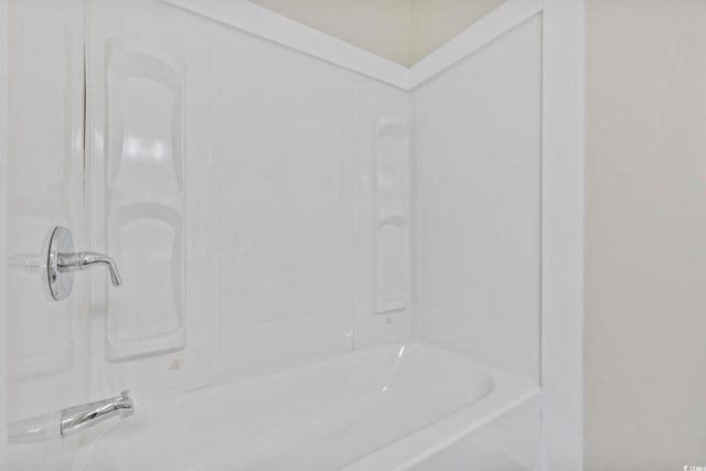 bathroom featuring a tub to relax in and walk in shower