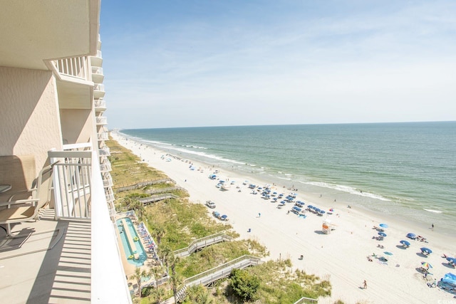 view of water feature with a beach view