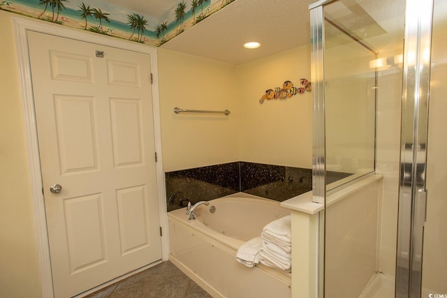 full bathroom with tile patterned flooring, a shower stall, and a bath