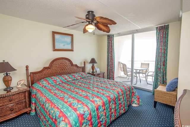 carpeted bedroom with access to exterior, ceiling fan, floor to ceiling windows, and a textured ceiling