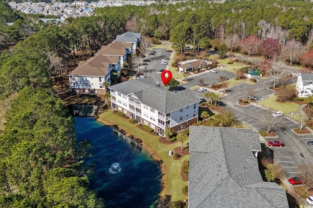 bird's eye view with a water view