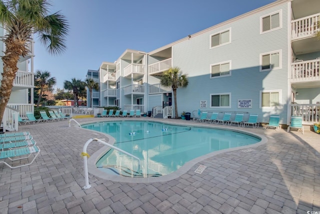 community pool featuring a patio