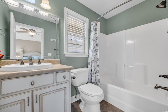 full bathroom featuring ceiling fan, toilet, vanity, tile patterned floors, and shower / tub combo with curtain