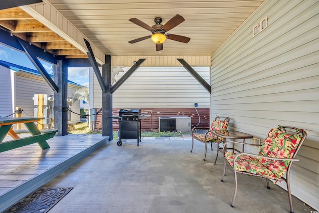 view of patio / terrace with a ceiling fan, grilling area, and central air condition unit