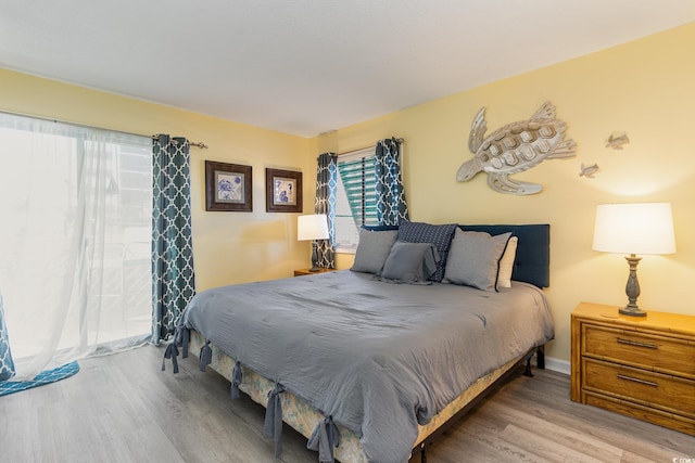 bedroom with wood finished floors