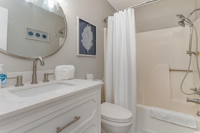 full bathroom with vanity, toilet, and shower / tub combo with curtain