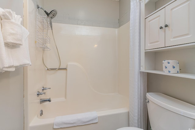 full bath with shower / bath combination with curtain and toilet