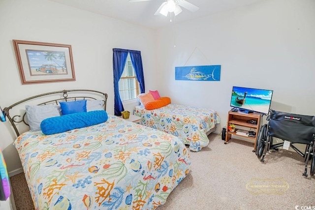 carpeted bedroom with a ceiling fan