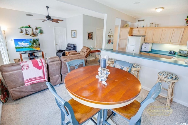 dining area featuring visible vents and ceiling fan