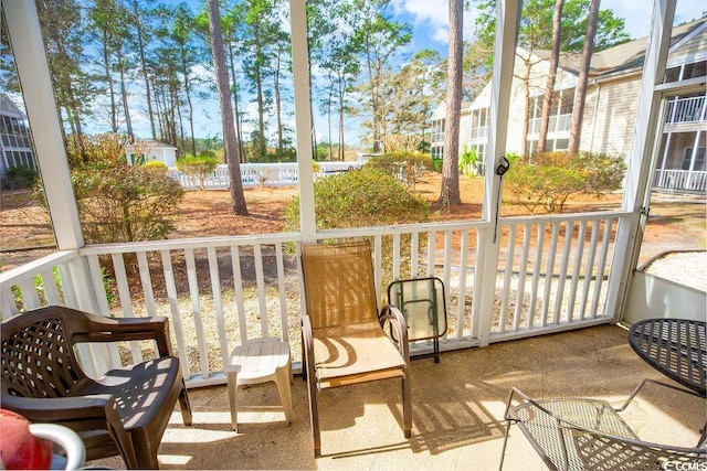 sunroom / solarium featuring a wealth of natural light