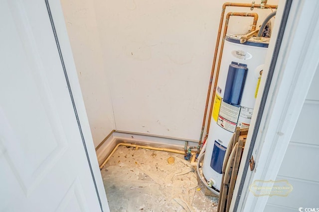 utility room with electric water heater