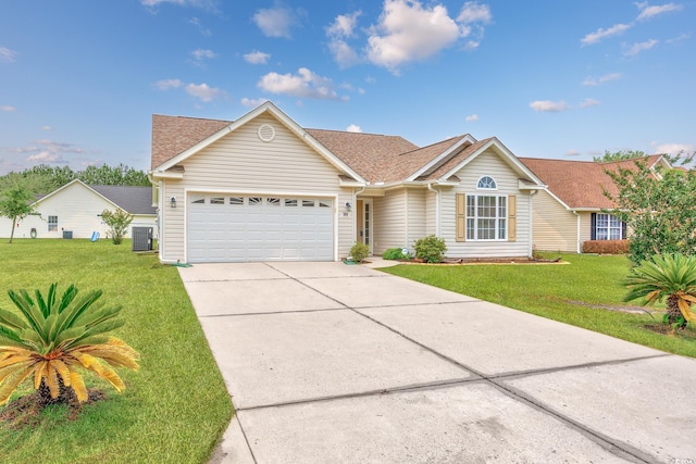 286 Bonnie Bridge Cir, Myrtle Beach, SC 29579 - ranch-style house featuring concrete driveway, a garage, cooling unit, and a front yard