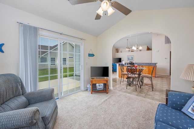 286 Bonnie Bridge Cir, Myrtle Beach, SC 29579 - living area featuring arched walkways, a ceiling fan, lofted ceiling, a chandelier, and carpet
