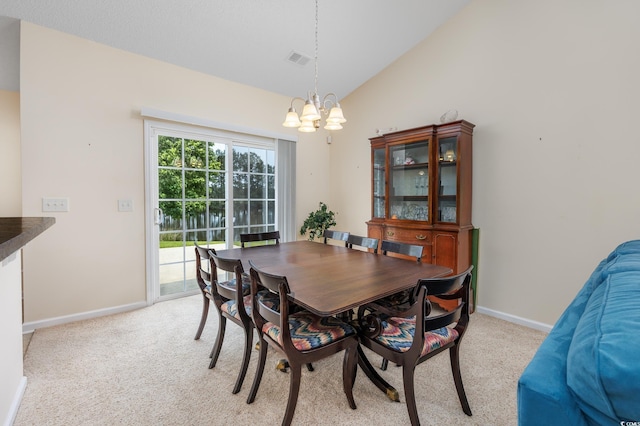 286 Bonnie Bridge Cir, Myrtle Beach, SC 29579 - dining area featuring a chandelier, light carpet, lofted ceiling, and baseboards