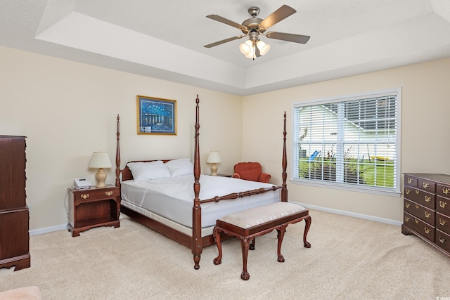 286 Bonnie Bridge Cir, Myrtle Beach, SC 29579 - bedroom featuring a tray ceiling, carpet floors, baseboards, and ceiling fan