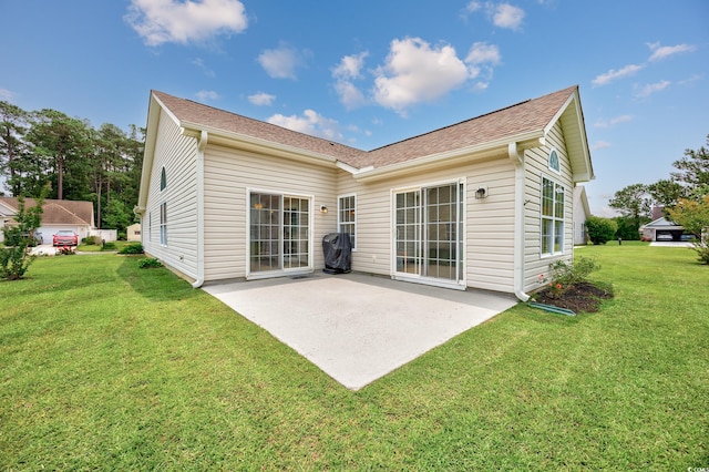 286 Bonnie Bridge Cir, Myrtle Beach, SC 29579 - rear view of house featuring a patio, a yard, and roof with shingles