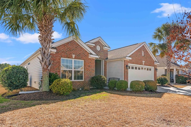 4517 Planters Row Way, Myrtle Beach, SC 29579 - traditional home with a front lawn, driveway, a garage, and brick siding