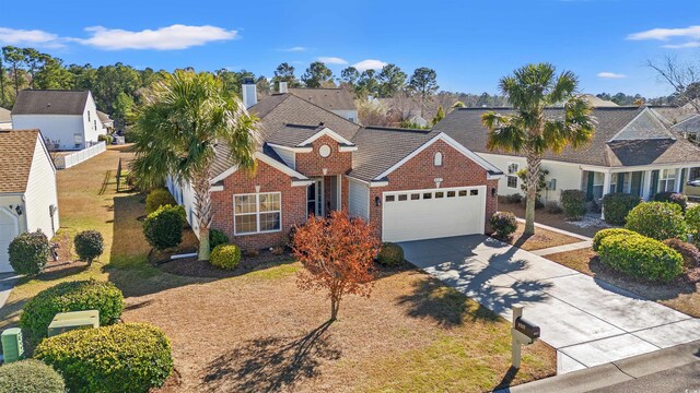 4517 Planters Row Way, Myrtle Beach, SC 29579 - traditional home featuring brick siding, an attached garage, driveway, and a residential view