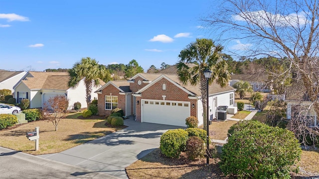 4517 Planters Row Way, Myrtle Beach, SC 29579 - traditional-style home with concrete driveway, central AC unit, brick siding, and an attached garage